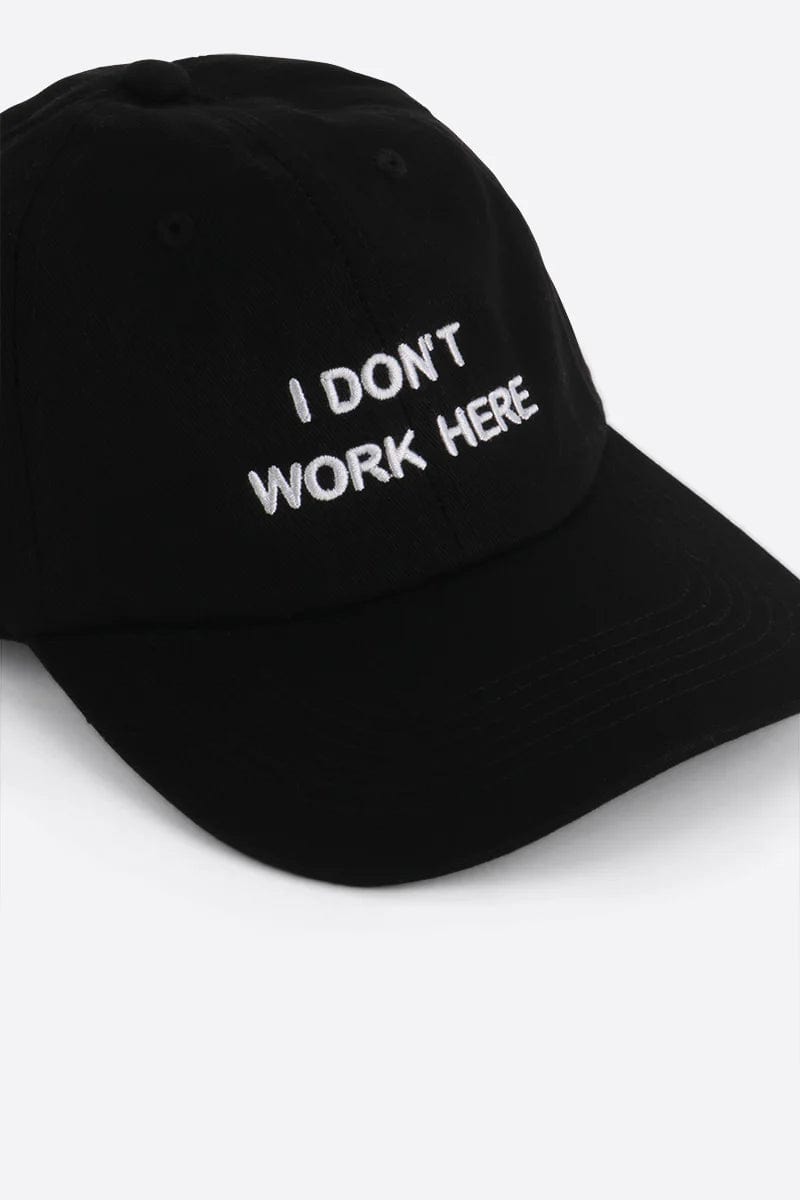 INTENTIONALLY BLANK ACCESSORIES Black White I Don't Work Here Dad Cap